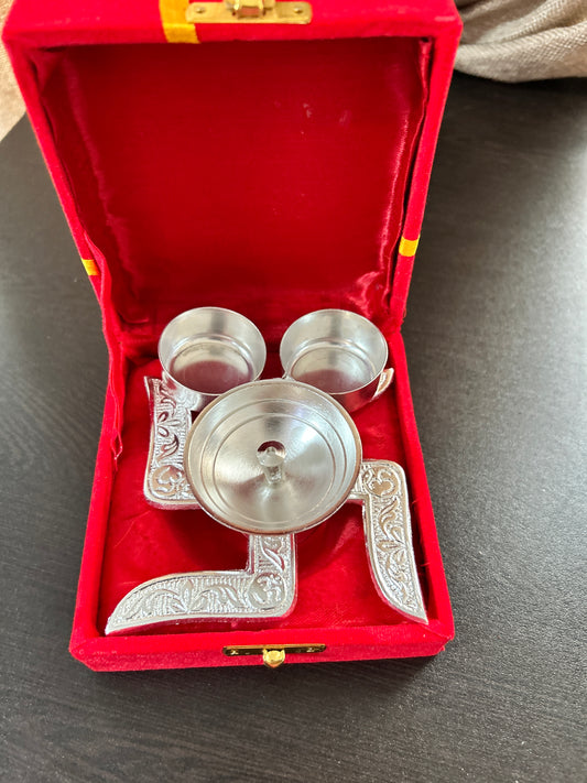 Swastik diya with haldi kumkum bowl