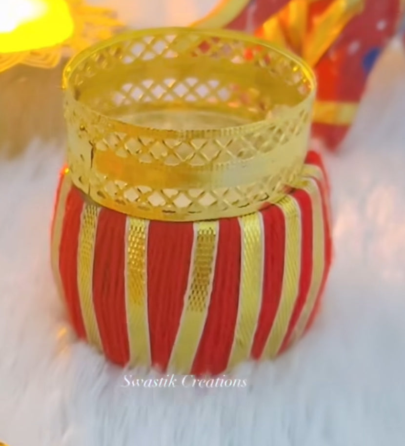 Diwali hamper (Patola Potli Hamper with Ganpati Lakshmi Frame & Damru T-Light)
