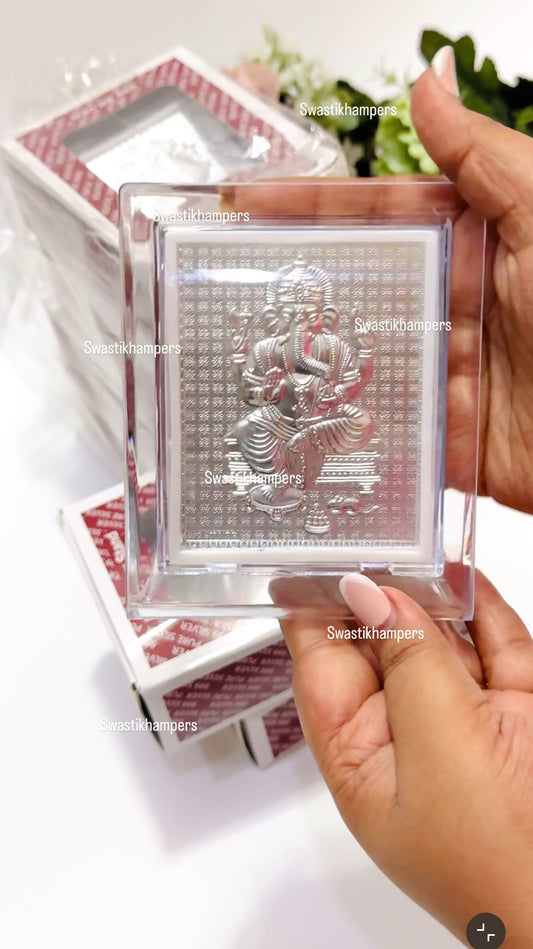 Elegant 999 Silver Ganpati Frame with Festive Potli – Ganesh Chaturthi Return Gift