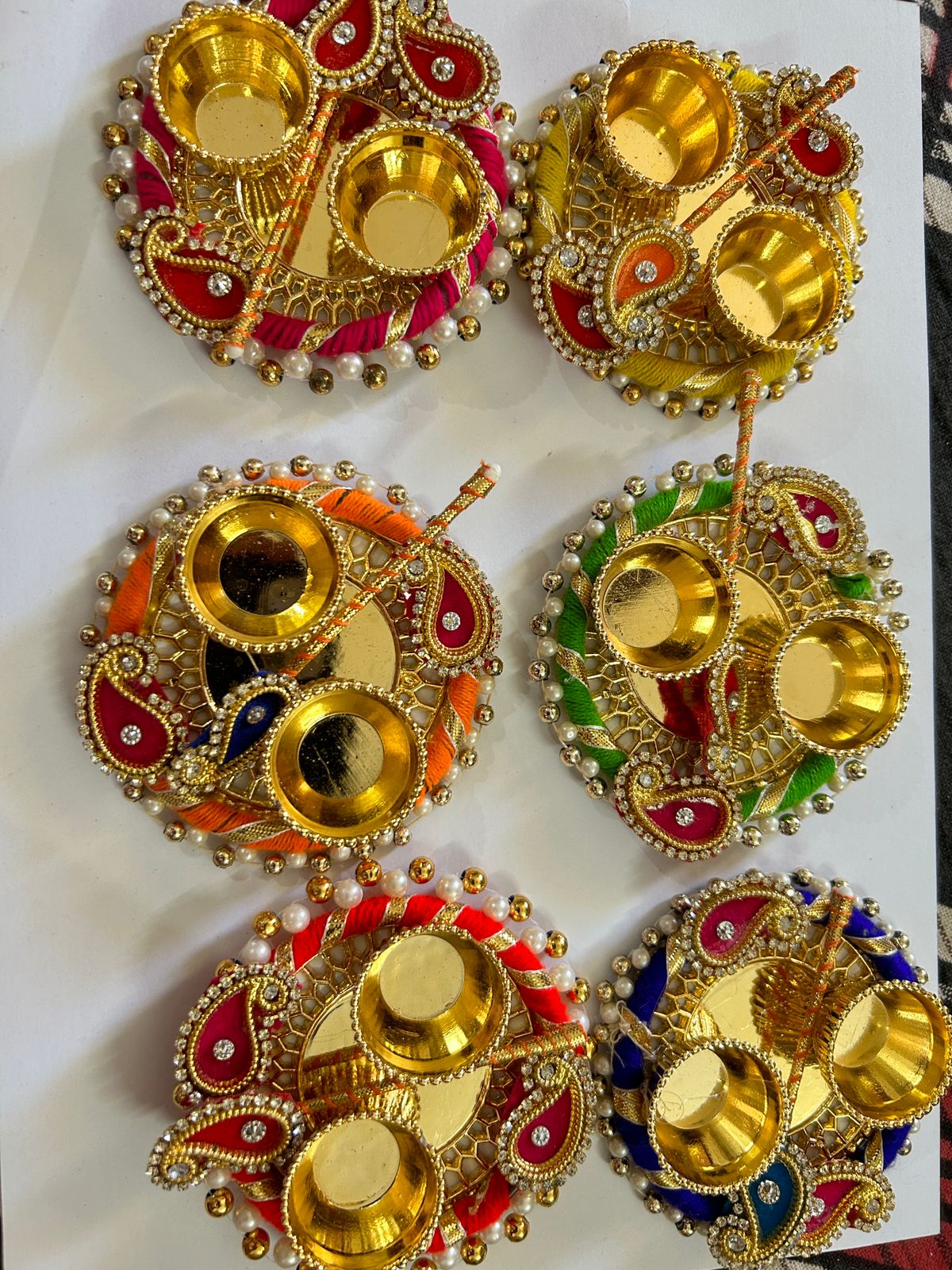 Vibrant tilak plate with tilak stick