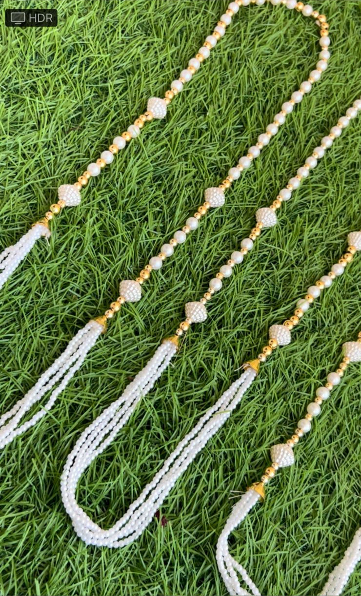 Multilayered pearl swagat mala