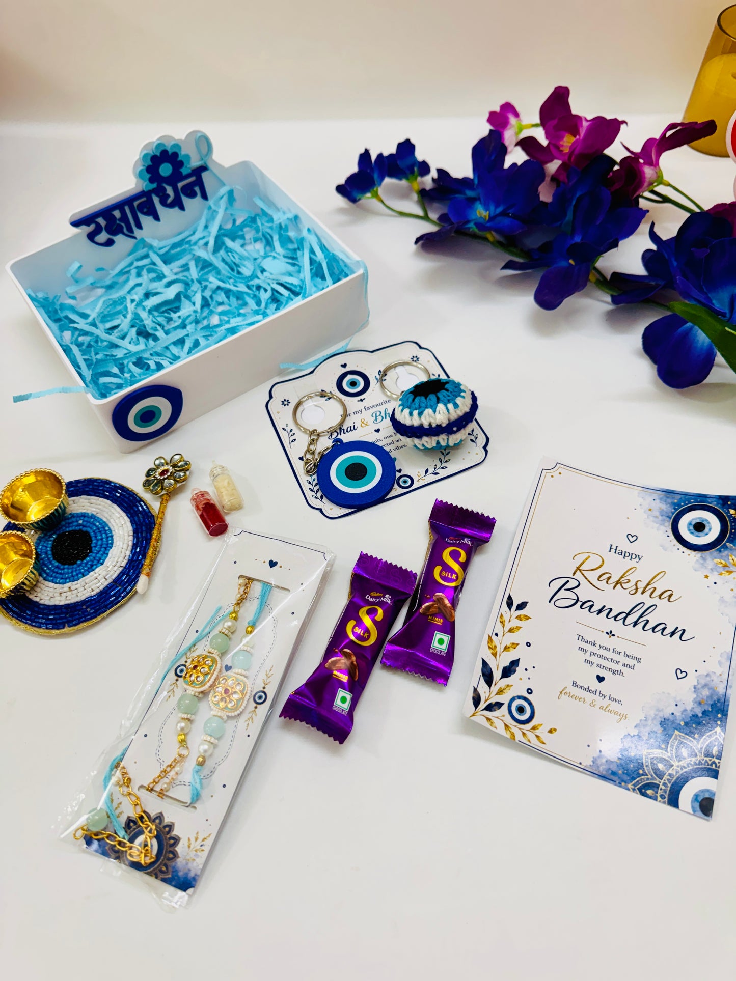 Evil Eye Rakhi Hamper for Bhai & Bhabhi | Premium Raksha Bandhan Gift Box