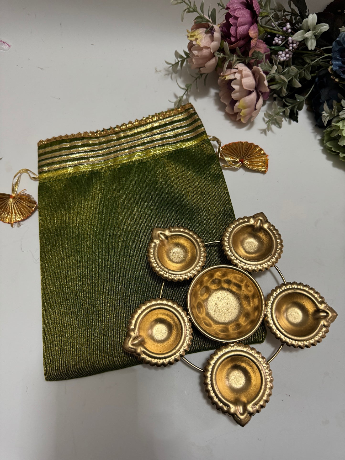 Brass Coated Urli with Double Organza Potli