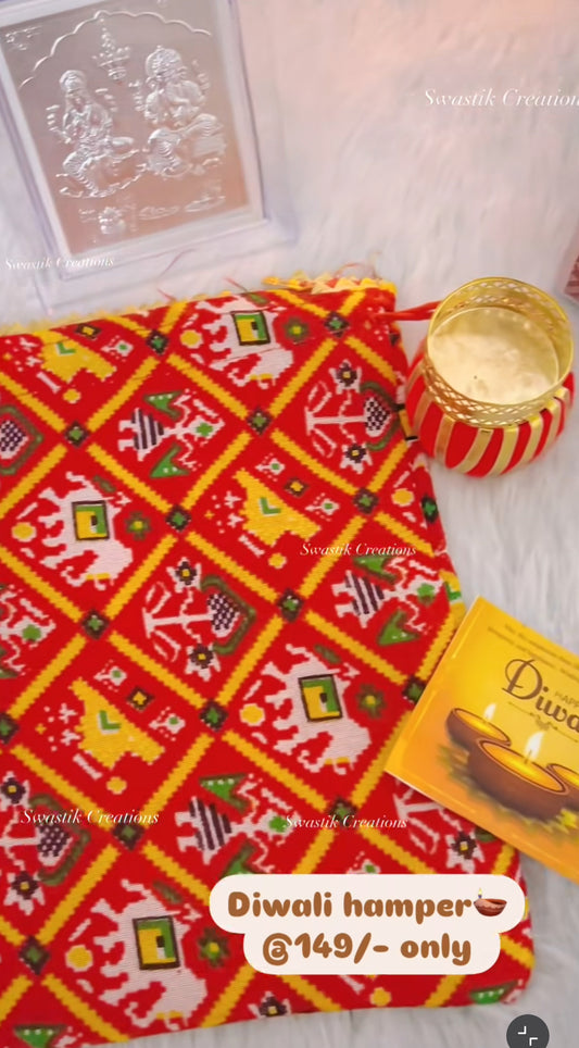 Diwali hamper (Patola Potli Hamper with Ganpati Lakshmi Frame & Damru T-Light)