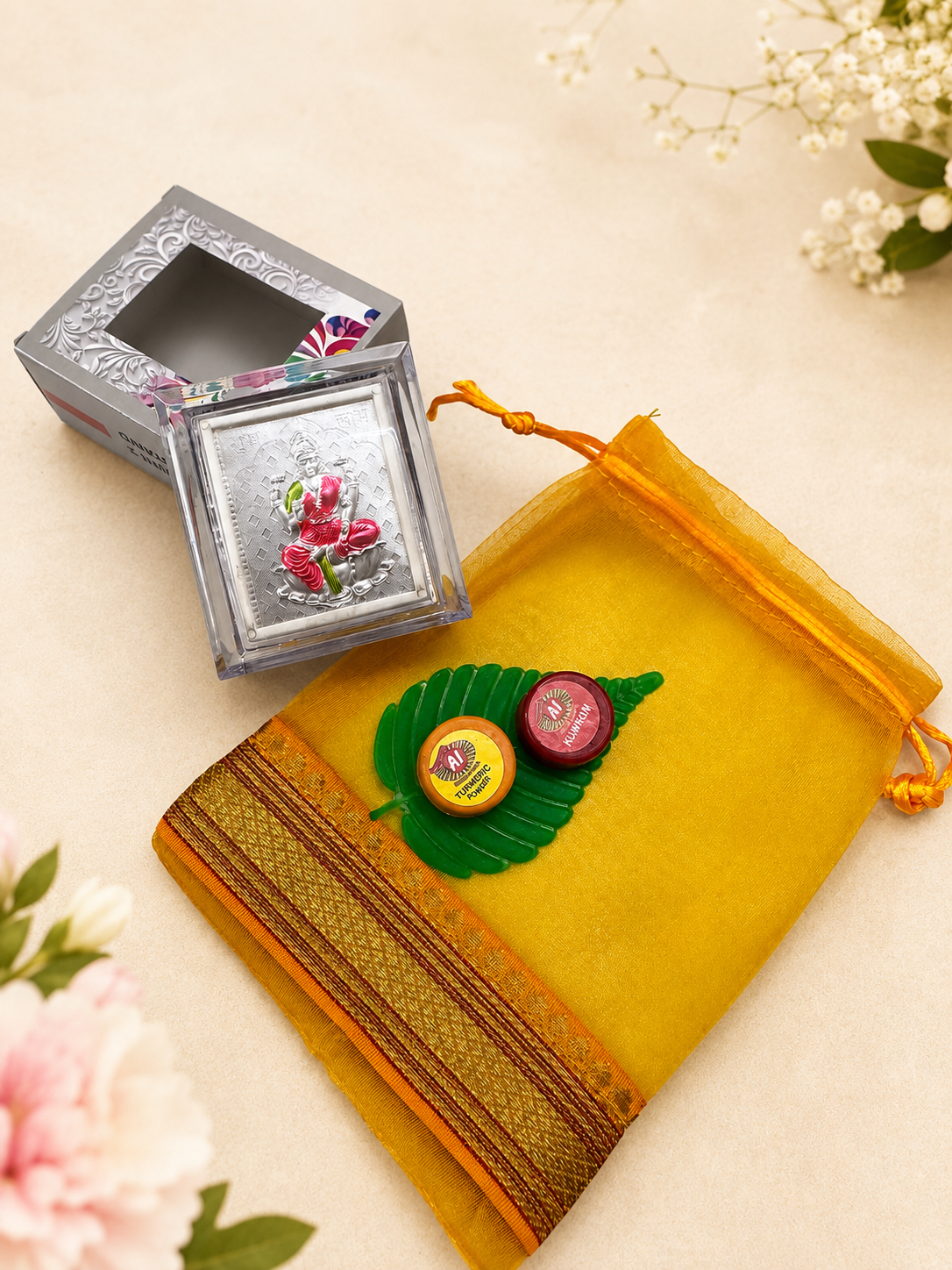 Varalakshmi Hamper | Banarasi Organza Potli with 999 Silver Lakshmi Frame & Kumkum Manjal Set