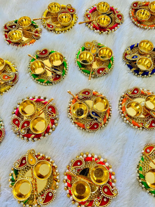 Vibrant tilak plate with tilak stick