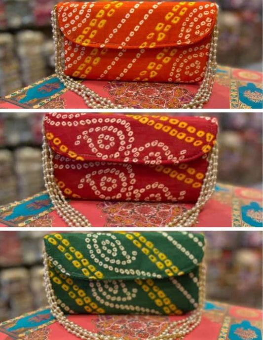 Bandhej sling clutch bag