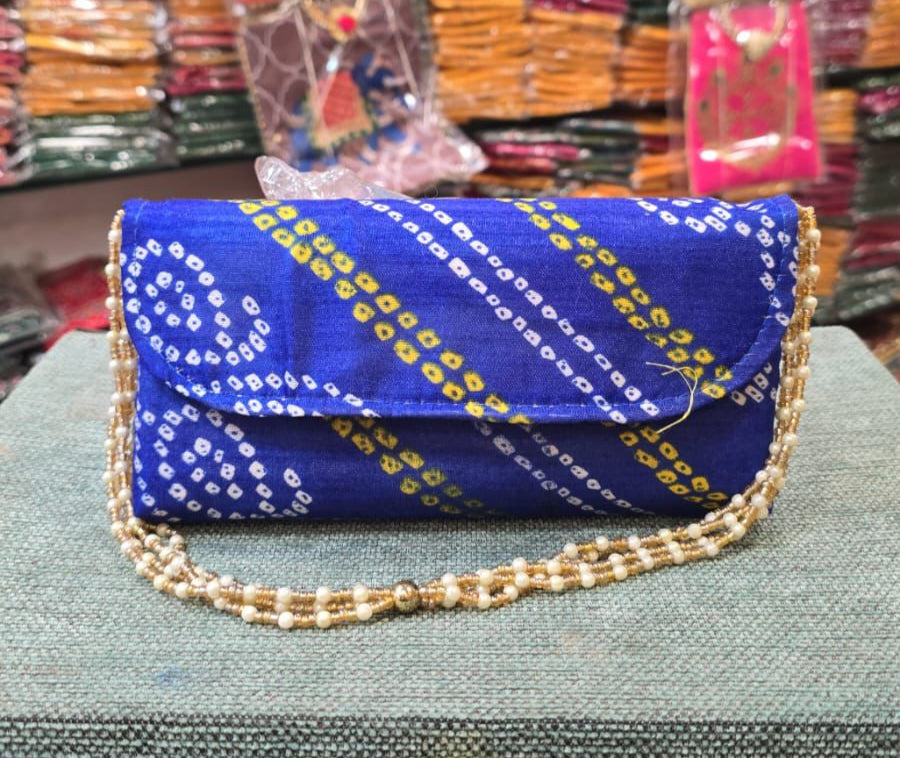 Bandhej sling clutch bag